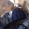 A huge truck tyre caught trapped between massive boulders bears testament to the power of water